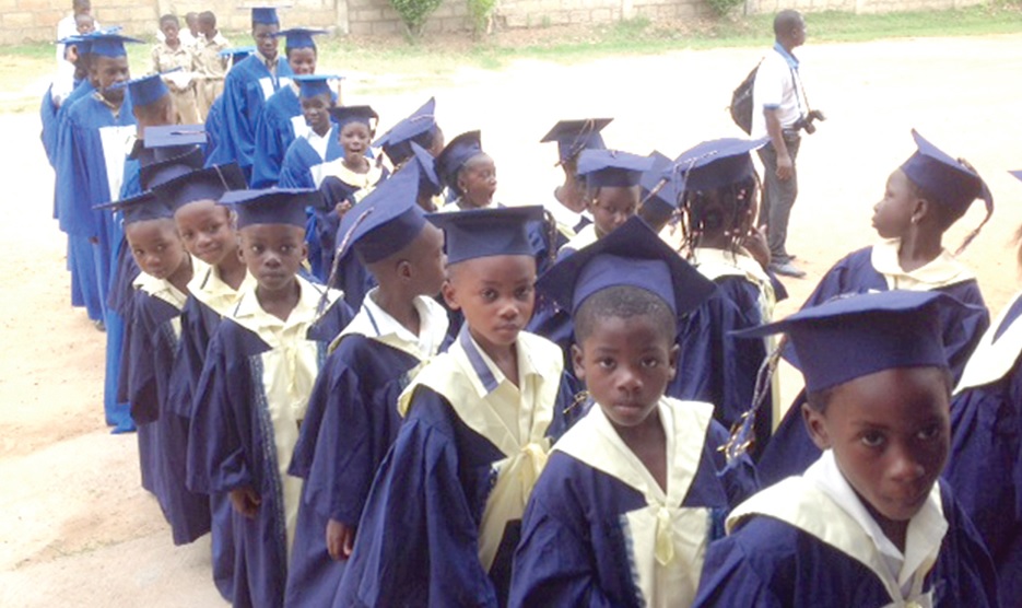 raduands of the Revival Educational Complex, at Sakaman, processing to the graduation grounds, when the school held its Speech and Prize-giving Day.