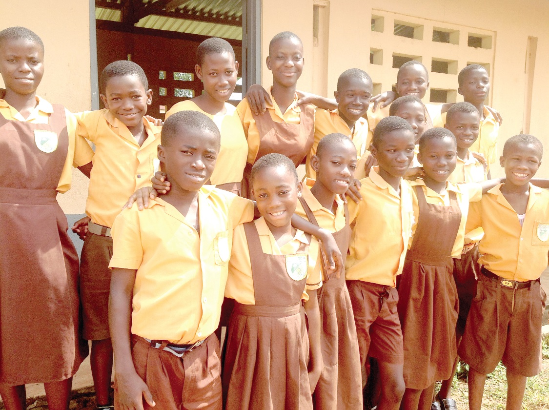 Wendy (second from left on first row) and some of her classmates