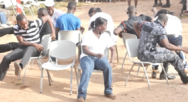 Community members engage in a recreational event involving physical activity.