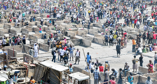 The concrete base of the wooden market stalls are usually what survive the market fires