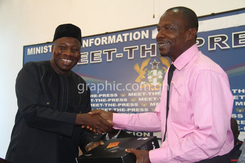 GJA Vice President, Affail Monney (R) receiving the laptops on behalf of the GJA from Mahama Ayariga (L)