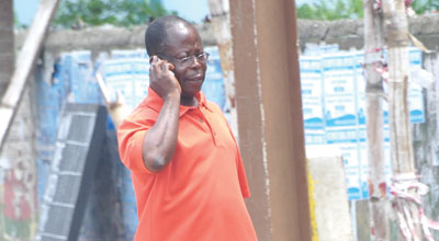 A mobile phone subscriber receiving a call
