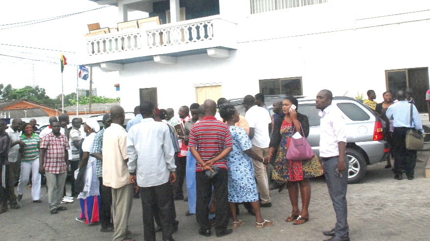 Some NPP sympathises waiting at the party headquarters while the NEC meeting was in session yesterday. 