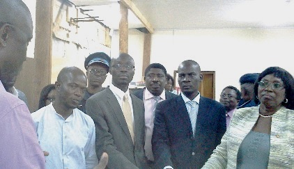 From right: Madam Dizifa Attivor, Transport Minister; Haruna Iddrisu, Trade and Industry Minister and other officials, stunned by the cause of delays at the port.