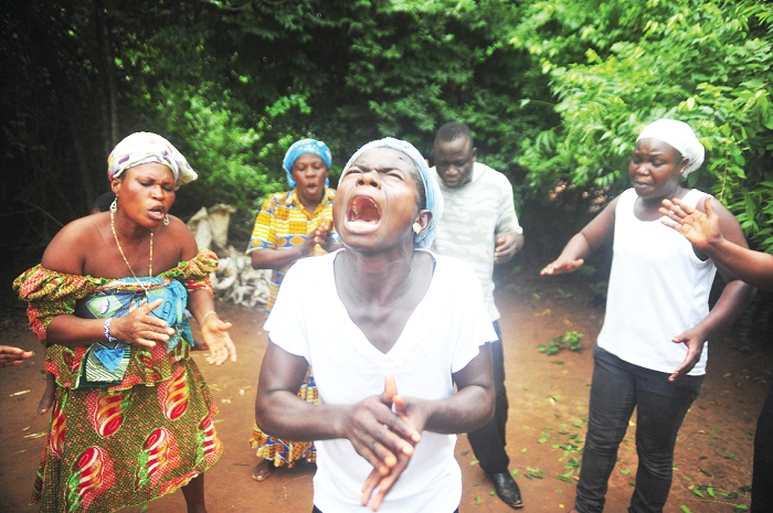 A prayer team at the Achimota Forest