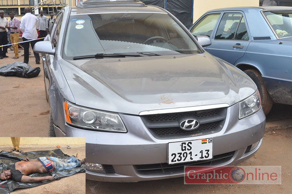 The getaway vehicle in the Fumesua bank robbery incident which has been impounded by the police. INSET: The body of the deceased. Picture by J.K. Essel