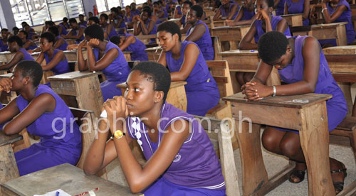 Students writing exams Students writing exams