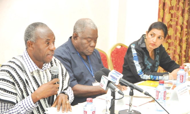 Alhaji Collins Dauda (in smock), Minister of Water Resources, Works and Housing delivering his keynote address at the workshop.With him are Nii Boi Ayibotele (3rd left) of Glowa Water Partnership, and Mrs Ruby Sandhu-Rojon, Resident Representative of the United Nations Development Program (UNDP).