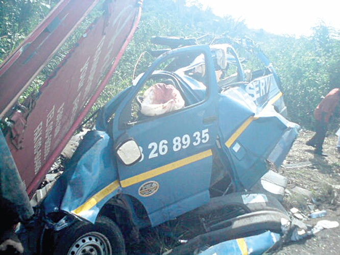 The mangled minibus at the accident spot.