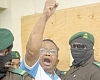 Tundu Lissu, Tanzanian opposition leader, shouting out a slogan to his supporters on his way to court
