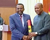 FLASHBACK: President John Mahama (right) handing  over the scroll of office to Dr Johnson Asiama,  Governor of the Bank of Ghana