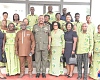 Lieutenant General William Agyapong (4th from left), Chief of the Defence Staff, with management and students of Effiduase Senior High Commercial School