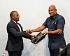 Ebenezer Ahumah Djietror (left), Clerk to Parliament, exchanging the signed MoU with Ato Afful, Managing Director, Graphic Communications Group Ltd. Picture: ELVIS NII NOI DOWUONA 