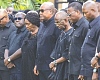 President John Mahama (middle) with Vice-President Prof. Naana Jane Opoku-Agyemang (4th from left), top government officials, and NDC national executives in a solemn mood during the flower-laying ceremony  