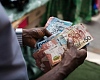 Bank of Ghana slashes cost of printing money by more than half as currency in circulation rises