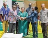 Linda Obenewaa Akweley Ocloo (middle), Greater Accra Regional Minister, being assisted by Bright Demordzi  (2nd from left), National Coordinator of the Feed  Ghana Programme, to hand over the fowls to the Accra Metropolitan Assembly. Picturs: ELVIS NII NOI DOWUONA 