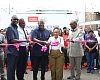 Theophilus Yartey (middle), Editor, Graphic, with Dr Abiba Zakaria (2nd from right), Commissioner of Insurance, National insurance Commission; Franklin Sowa (2nd from left), Director, Sales and Marketing, GCGL; Dr Nashiru Iddrisu (left), First Vice President, GIA, and Seth Kobla Aklasi (right), President, GIA, cutting the ribbon to open the insurance fair held in Accra. Picture: BENEDICT OBUOBI