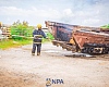 Godwin Edudzi Tamekloe (left), Chief Executive Officer of NPA, and a fire expert setting fire to the boats