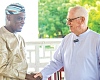 Rev. Fr Andrew Campbell (right), Founder of the Father Campbell Foundation, welcoming Haruna Iddrisu, Education Minister, to the centre 