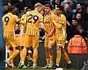 Brighton & Hove Albion players celebrating their achievement