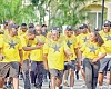 •  Julius Debrah (arrowed), Chief of Staff, participanting in the health walk with the enthusiastic supporters