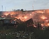 The raging fire causing damage to the wooden structures