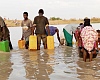 Residents resorting to unwholesome water  at a dam at Kukuo, a suburb of Tamale