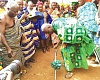 Osagyefo Oseadeeyo Agyemang Badu (with the pickaxe), President of the Bono Regional House of Chiefs, cutting the sod for the start of the project
