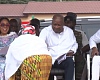 President John Mahama (middle) handing the money to the dancer. With him are Mrs Linda Akweley Ocloo, Greater Accra Regional Minister and Fifi Kwettey, NDC General Secretary