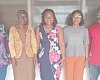 Prof. Akua Opokua Britwum (2nd from left), Chairperson, National Media Commission; Rev. Isaac Owusu  (left), member of NMC, with the staff of Cape Coast office of the Graphic Communications Group Ltd