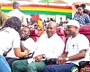 President John Dramani Mahama (2nd from right) and George Opare Addo (2nd from left), Minister of Youth Development and Empowerment   interacting with a beneficiary during the event