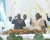 Asantehene, Otumfuo Osei Tutu II (holding mic), with his wife, Lady Julia Osei Tutu (2nd from right), and Dr Ibn Chambas (right), former President of the ECOWAS Commission, proposing a toast to honour Alhaji Yusif Ibrahim (seated left), on his 80th birthday, held at the Manhyia Palace in Kumasi last Friday. Picture: EMMANUEL BAAH