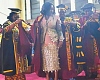 Dr Josephine Anan Ankomah (2nd from left), Managing Director, Ecobank, Kenya, being assisted by Prof. Nana Aba Appiah Amfo (2nd from right), Vice-Chancellor, UG, and Emilia Agyei Mensah (left), Registrar, UG, to put on the academic regalia. Picture: ERNEST KODZI