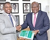 Kirk Koffi (right), Chairman of the Committee, presenting the report to Richard Gyan Mensah, Deputy Minister of Energy and Green Transition