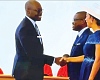 Dr Cassiel Ato Forson, Minister of Finance,  congratulating Romuald Wadagni, Benin President