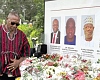Dr Clement Apaak, Deputy Minister of Education, paying his last respects to the deceased