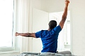 Stretching before getting out of bed wakes up the body