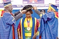 Sir Sam Jonah (left), Chancellor of UCC, and Justice William Atuguba, Chairman of the UCC Governing Council, robing Prof. Naana Jane Opoku-Agyemang at the ceremony