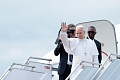 Pope Leo XIV waves as he boards a plane bound for Bamenda where he will attend a meeting for peace and hold a holy Mass, at Yaounde Nsimalen International Airport, in Yaounde, Cameroon, April 16, 2026. REUTERS/Luc Gnago