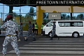 The deportees were escorted from Freetown International Airport in a white van