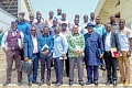 •Samir Captan (4th from right, front row), GBIMC Chairman, and committee members with Yaw Ampofo Ankrah, NSA Director-General