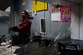 33-year-old Princess Adjei stands in her salon, which was destroyed in a xenophobic attack on May 18, in Durban, South Africa, June 9, 2026. REUTERS/Rogan Ward