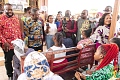 Kwabena Mintah Akandoh (2nd from left),  Minister of Health, speaking to some patients at the hospital. Standing left is Michael Kpakpo Allotey,  Chief Executive of AMA