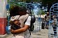 Inmates emerged from La Lima prison in eastern Havana to hug waiting relatives