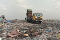 A waste disposal truck emptying a truck at the peak of the mountainous dumpsite. Pix By Benjamin Xornam Glover