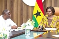Prof. Naana Jane Opoku-Agyemang, Vice-President, engaging Emmanuel Armah-Kofi Buah (left), Minister of Lands and Natural Resources, during her visit to the ministry