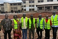Emmanuel Kwasi Bedzrah(middle), Board Chairman of Ghana Education Trust Fund with other board executives at the site of the collapsed building.