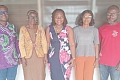 Prof. Akua Opokua Britwum (2nd from left), Chairperson, National Media Commission; Rev. Isaac Owusu  (left), member of NMC, with the staff of Cape Coast office of the Graphic Communications Group Ltd