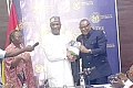 Emmanuel Habuka Bombande (right), Chairman of the committee, presenting the report to Muntaka Mohammed-Mubarak, the Minister for the Interior