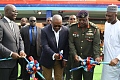 President John Dramani Mahama (2nd from left) cutting the ribbon to commission vehicles for the Ghana Armed Forces. Helping him are Dr Cassiel Ato Forson (left), acting Defence Minister, Lt Gen. William Agyapong (2nd from right), CDS, and Muntaka Mohammed-Mubarak (right), Interior Minister. Picture: BENEDICT OBUOBI